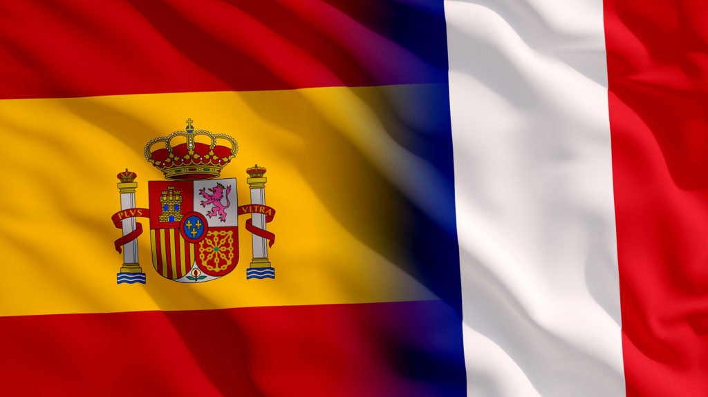 Bland Spaniens Frankrigs flag