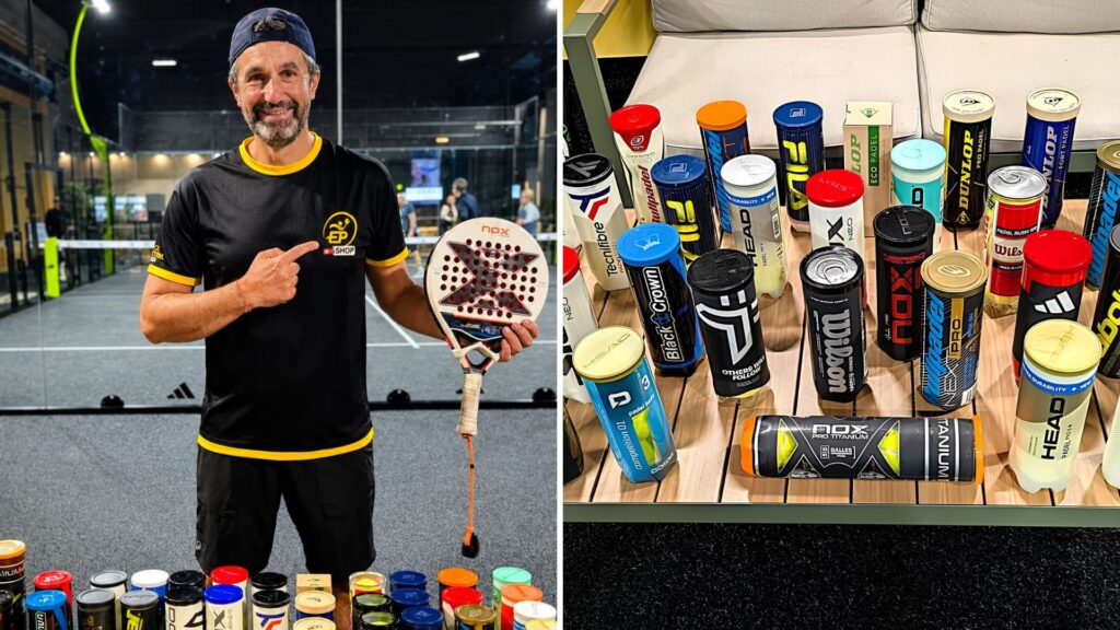 Man in black and yellow shirt holding a padel paddle on an indoor court, smiling at the camera.