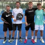 P1000 Sud Padel Bel Air - Cazes Carrere et Trancart font tomber la TS2 pour rejoindre Bernard Rubio en finale | Padel Magazine Four men stand together on a blue padel court, holding paddles and smiling at the camera.
