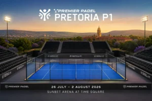 Padel court with blue glass walls and empty stands, branded Pretoria P1 tournament at Sunbet Arena, Time Square, sunset backdrop.