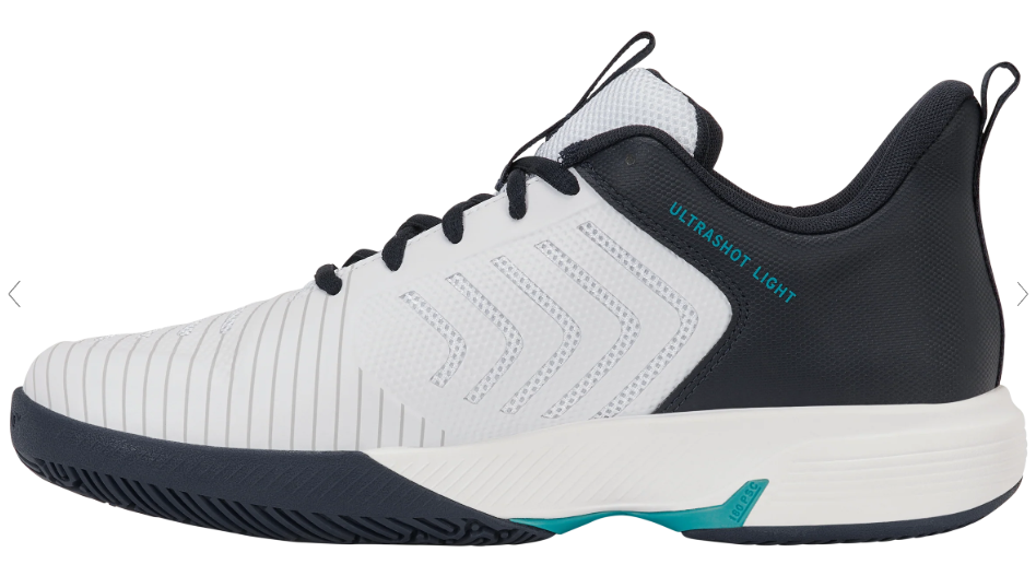 3 | Padel Magazine White and navy athletic shoe with black laces and turquoise Ultrashot Light branding on the side