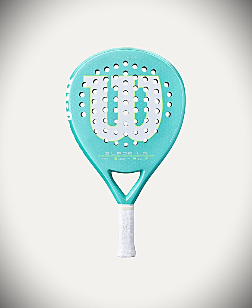 Blade LS | Padel Magazine Turquoise padel paddle with a perforated hitting surface and white grip, branded with a large U-shaped logo in the center