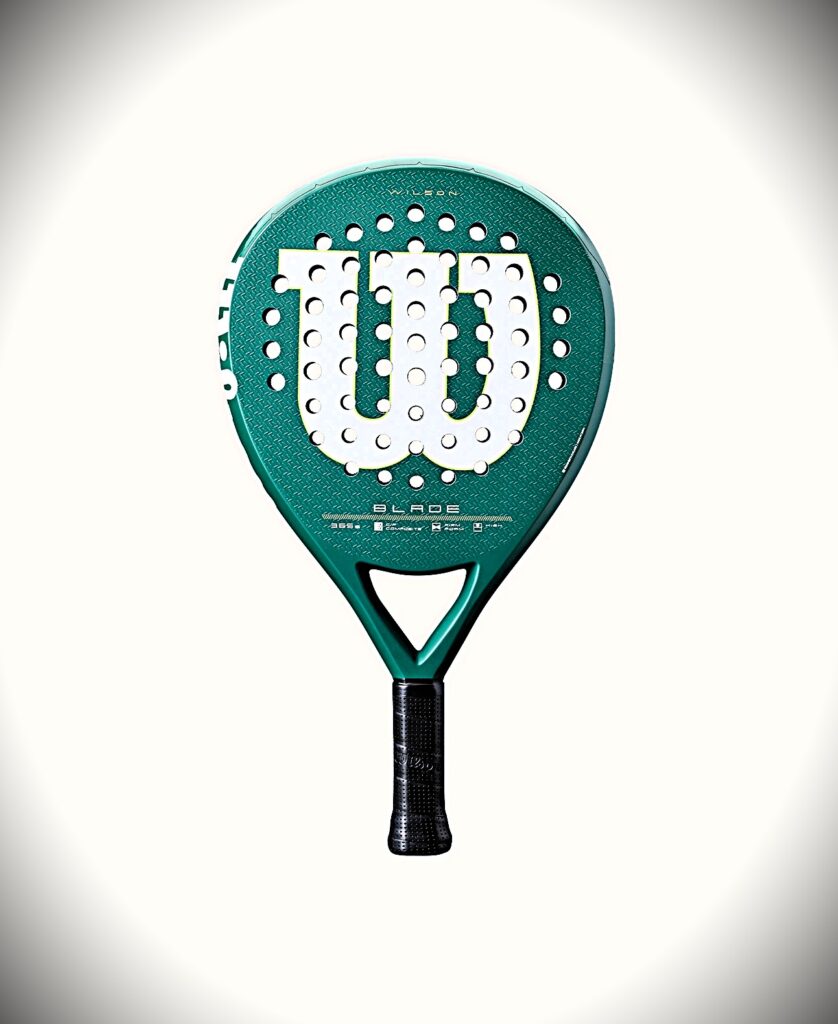 Blade V4 | Padel Magazine Teal paddle/ racket with a large white W logo and perforated face, black grip, against a light gradient background (informative product image).