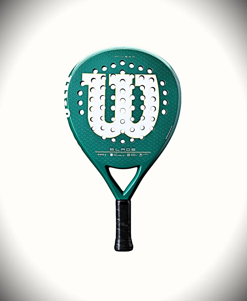 Racchette/paddle color verde acqua con grande logo W bianco e superficie perforata, impugnatura nera, su uno sfondo con una leggera sfumatura (immagine informativa del prodotto).
