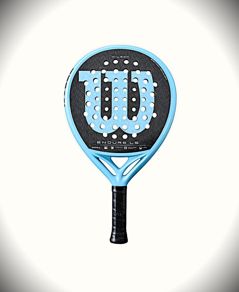 Blue Wilson Endure LS padel racket with a black perforated hitting surface and numerous white holes, handle at bottom against a light background.
